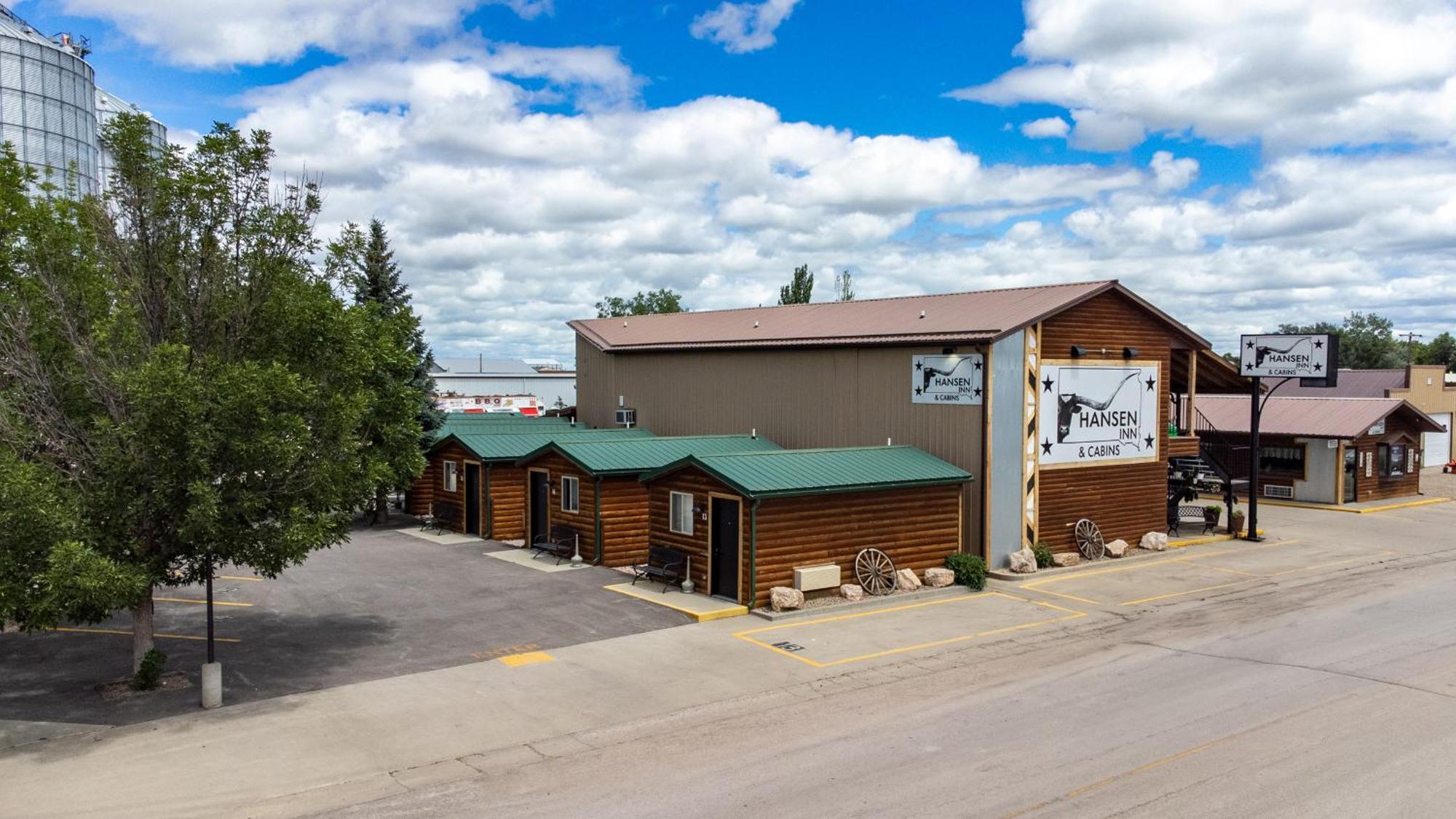 Hansen Inn & Cabins Wall Exterior foto